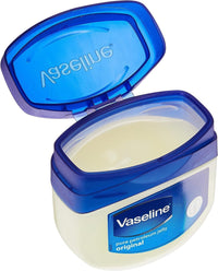 Vaseline pure petroleum jelly container with blue lid on a white background